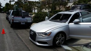 Car getting a side-view mirror replacement in Oceanside, CA.