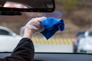 cleaning inside windshield