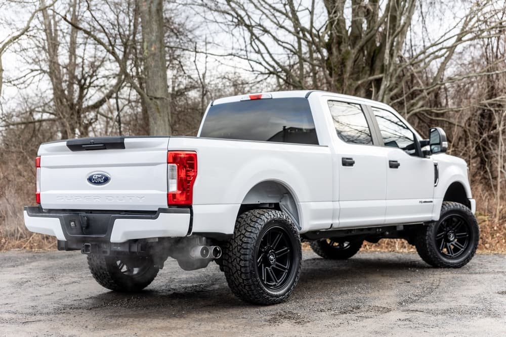 white-ford-pickup-truck-woods